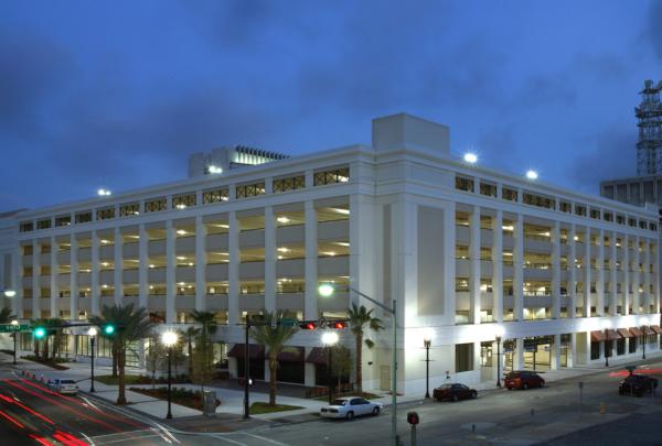 Exterior photo of City of Jacksonville parking garage at dusk.